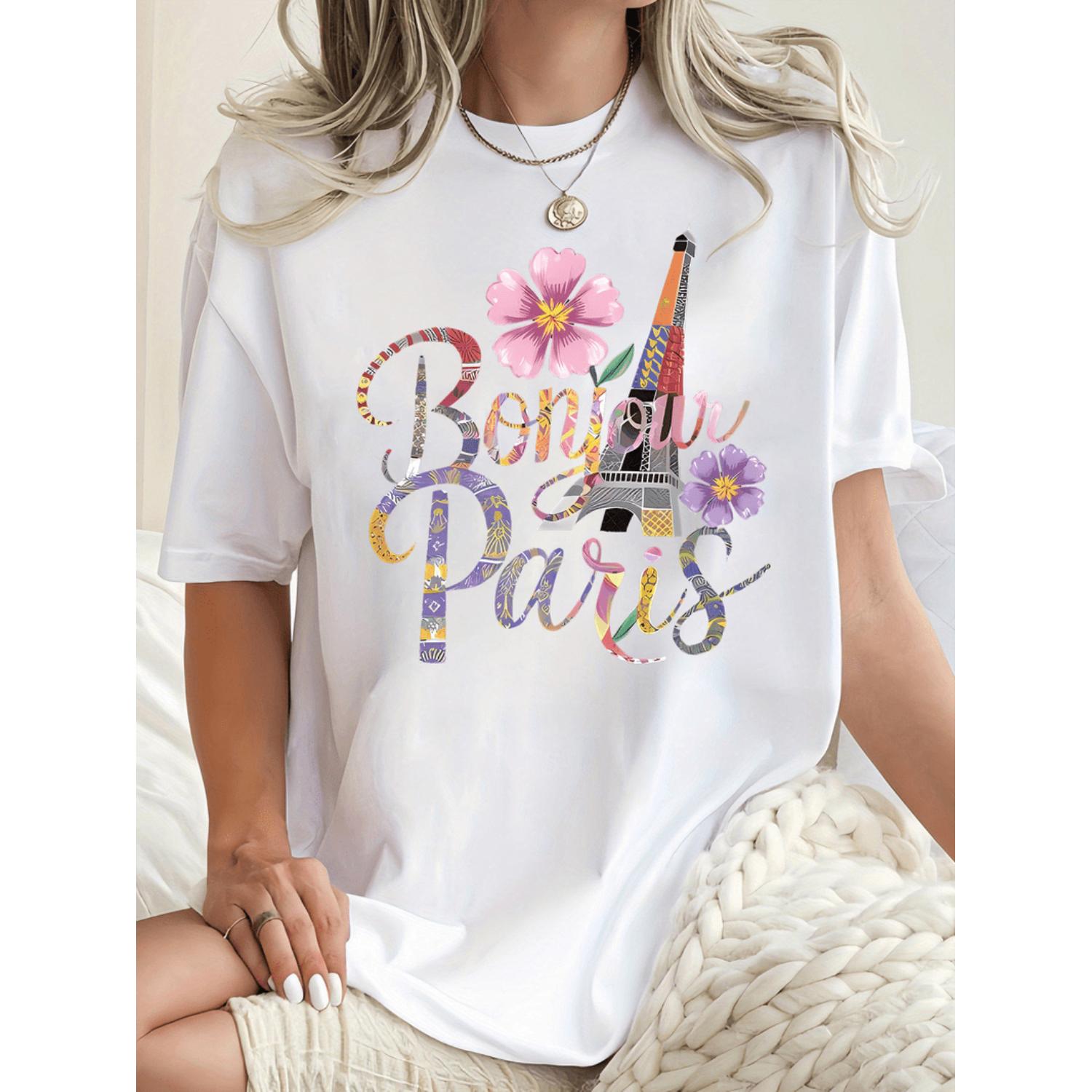 Casual Short Sleeve TShirt Featuring Bonjour Paris Graphic with Eiffel Tower and Floral Design Black Round Neck Comfortable Summer Top with Stretch Machine Washable Playful Print